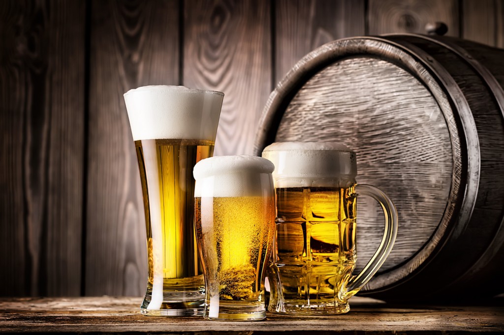 Two glasses and mug of light beer